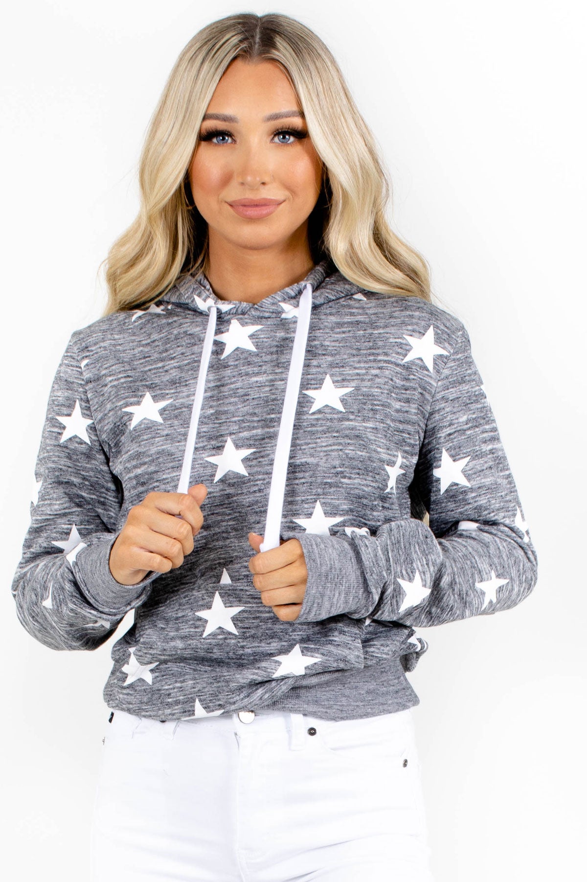 Gray hooded top with pockets and star patterns