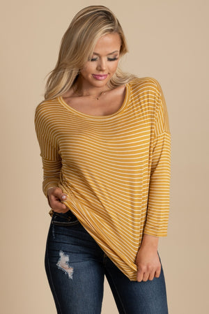 Yellow and White striped top.