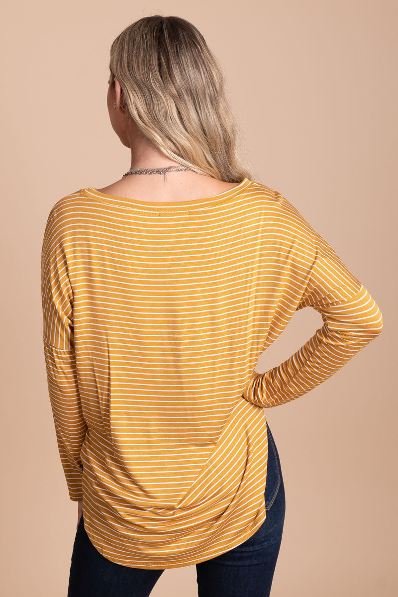 yellow long sleeve top with white stripes