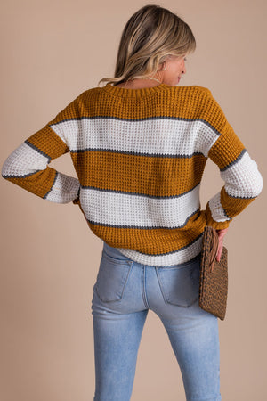 boutique mustard yellow women's striped long sleeve pullover